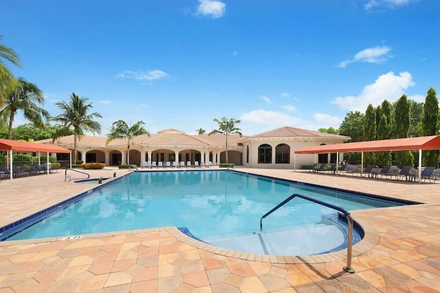 pool featuring a patio area