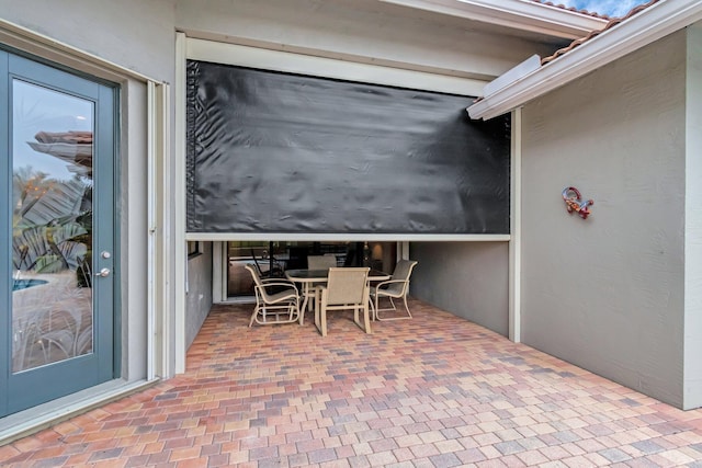 view of patio featuring outdoor dining area