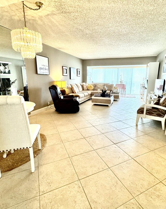 living area with light tile patterned floors and a textured ceiling