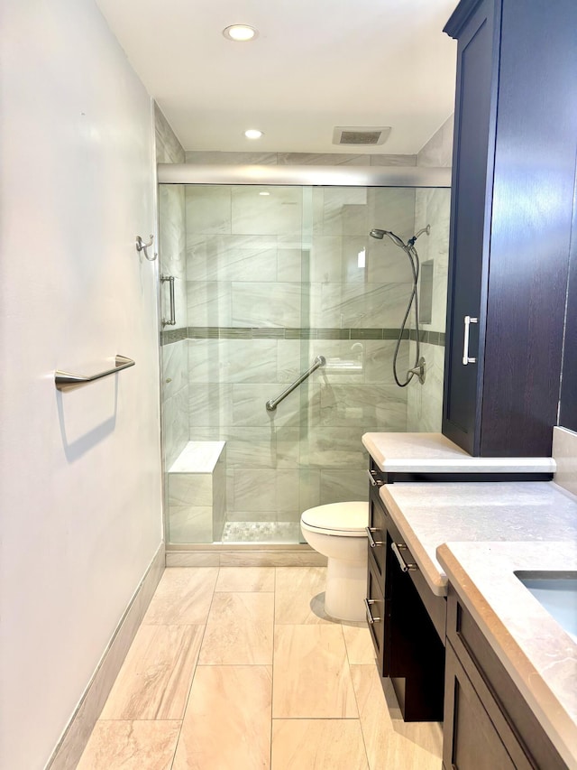 full bath with visible vents, toilet, recessed lighting, a shower stall, and vanity