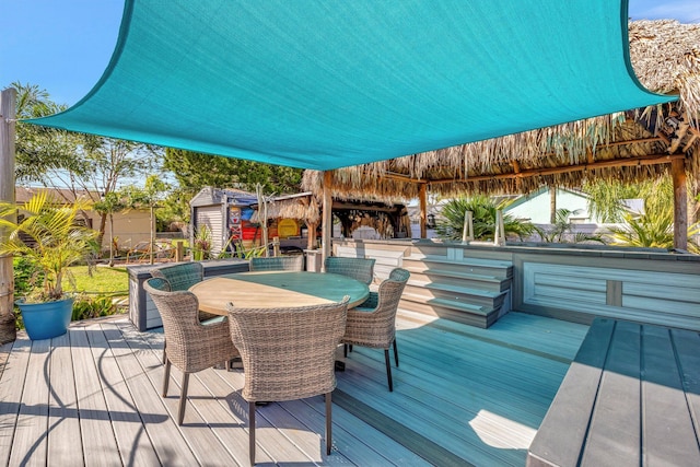 deck with outdoor dining space