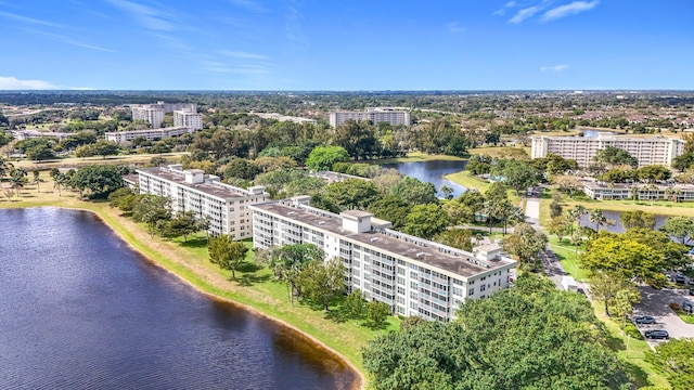 bird's eye view featuring a water view and a city view