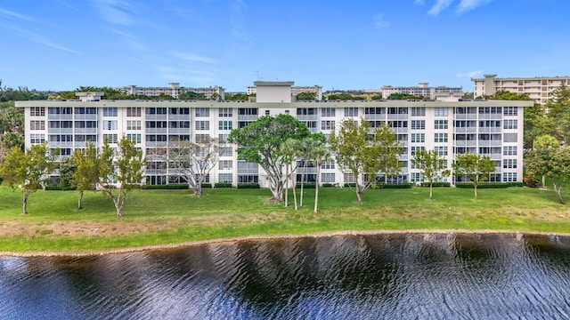 view of property with a water view