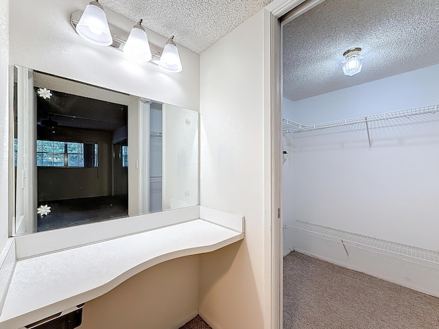 bathroom with a textured ceiling