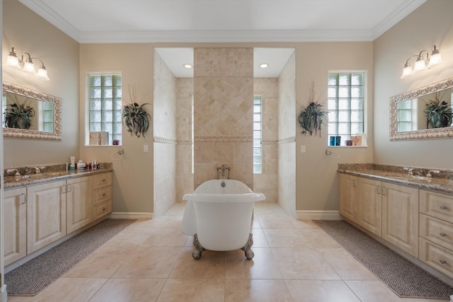 bathroom featuring baseboards, two vanities, crown molding, and tile patterned floors