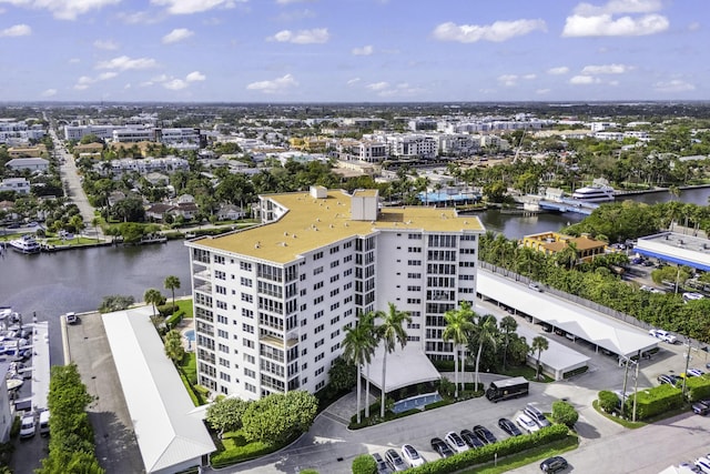 drone / aerial view with a water view and a city view