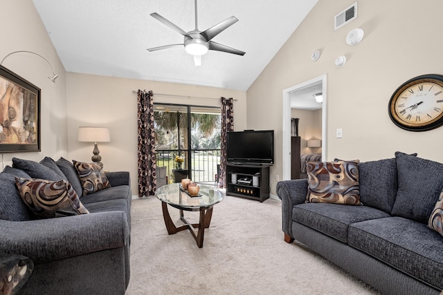 living room with light carpet, high vaulted ceiling, ceiling fan, and visible vents