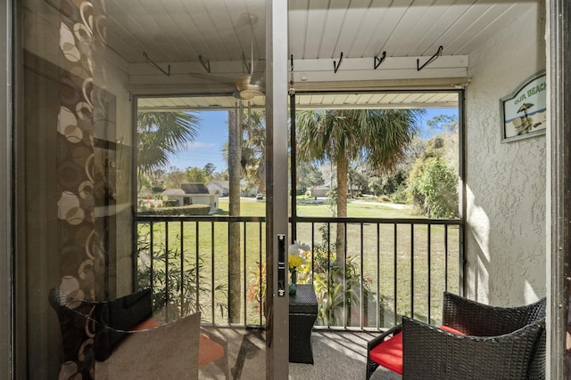 sunroom with wooden ceiling