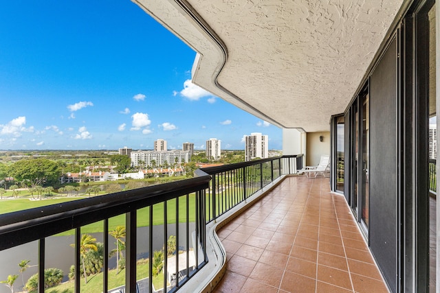 balcony featuring a city view