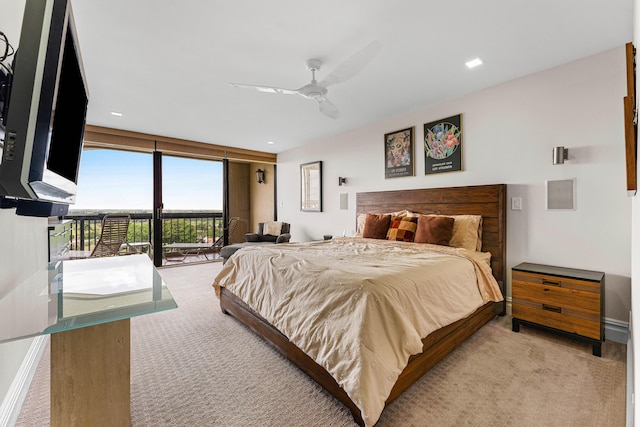 bedroom featuring access to outside, light colored carpet, and ceiling fan