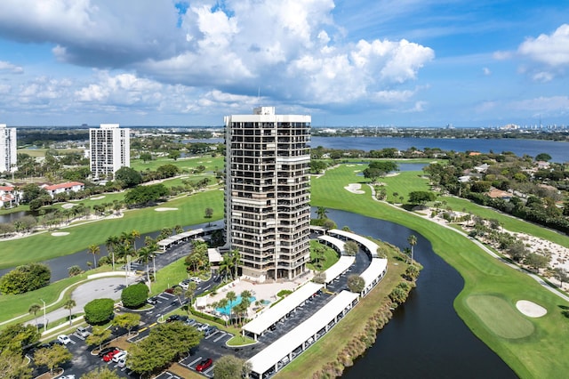 bird's eye view featuring a view of city, a water view, and golf course view