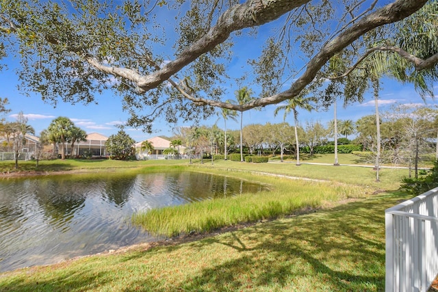 view of water feature with fence