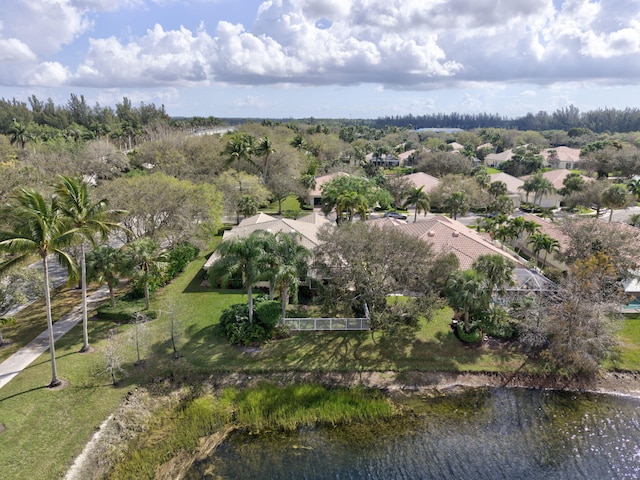 drone / aerial view featuring a water view and a residential view