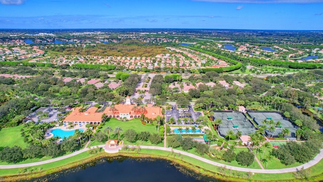 birds eye view of property featuring a water view