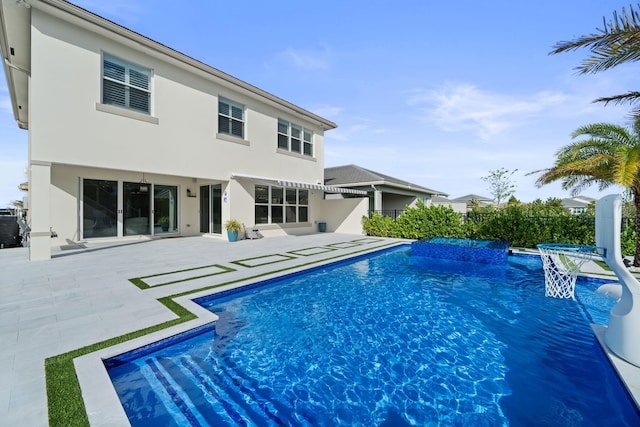 view of pool with a fenced in pool and a patio