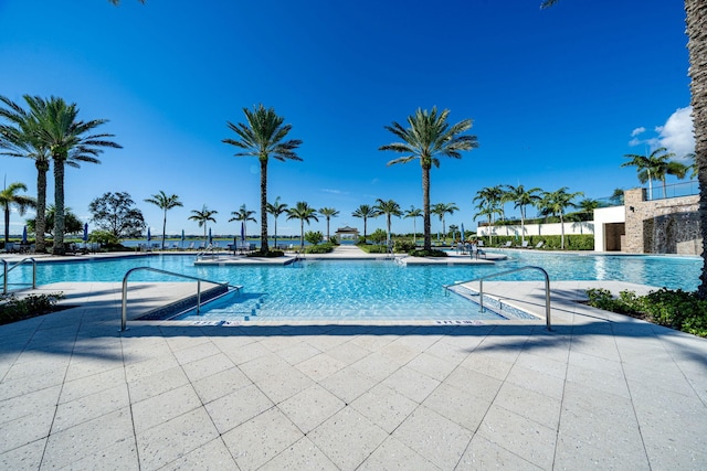 community pool featuring a patio area