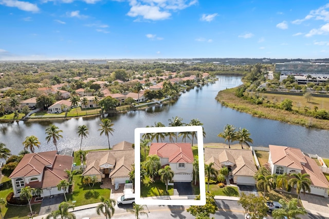 aerial view with a water view and a residential view