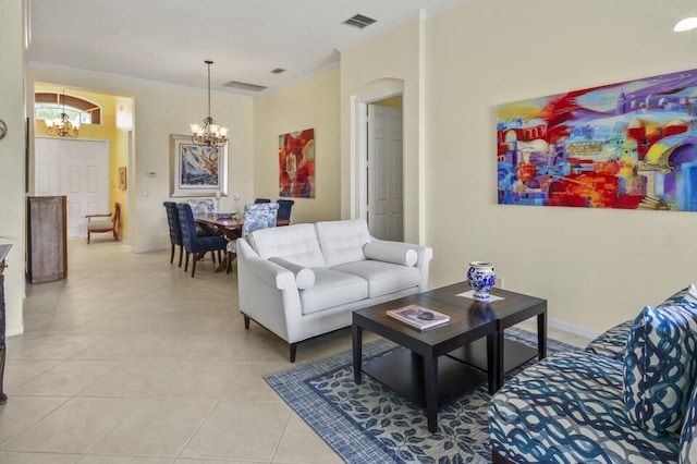 living area featuring crown molding, light tile patterned floors, visible vents, and a notable chandelier