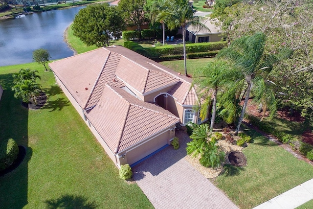 birds eye view of property featuring a water view