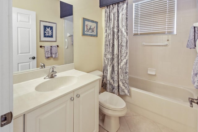 full bath with tile patterned flooring, vanity, toilet, and shower / bath combo