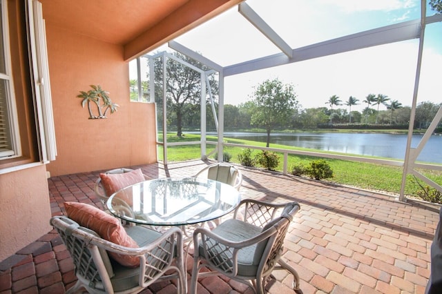 sunroom with a water view