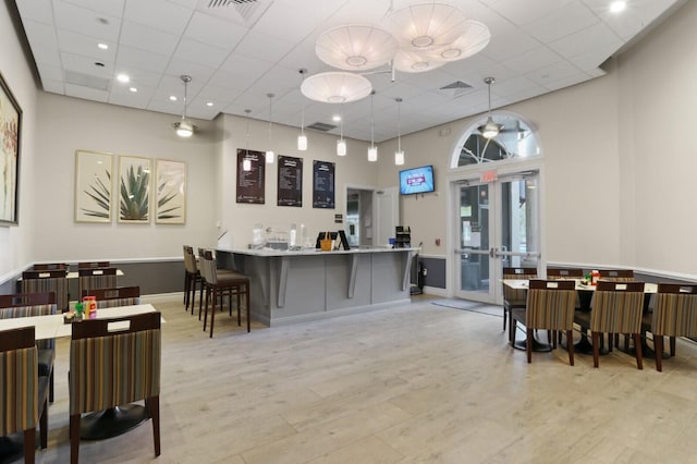 reception featuring visible vents and french doors