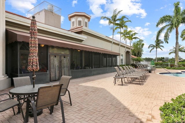 view of patio / terrace with a community pool