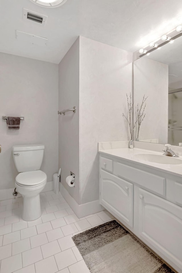 full bathroom featuring tile patterned floors, visible vents, toilet, vanity, and walk in shower