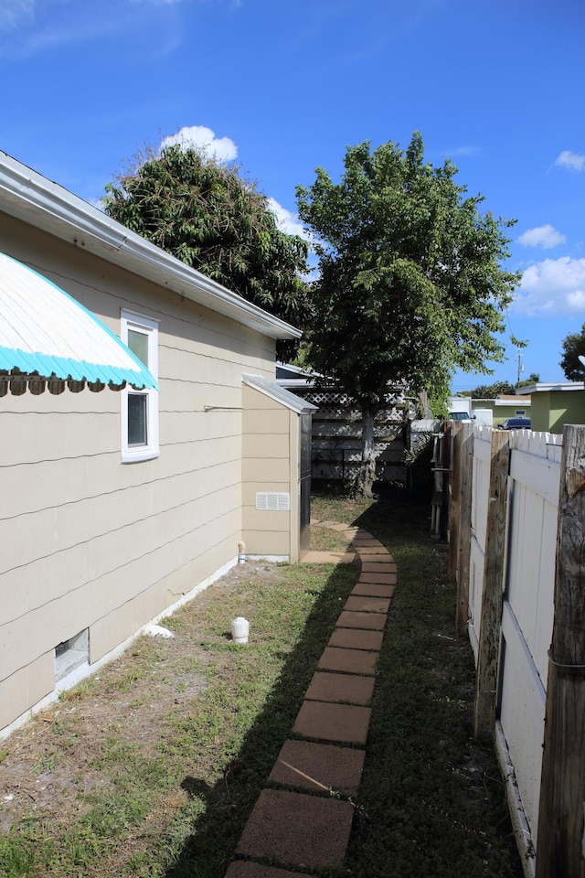 view of yard featuring fence