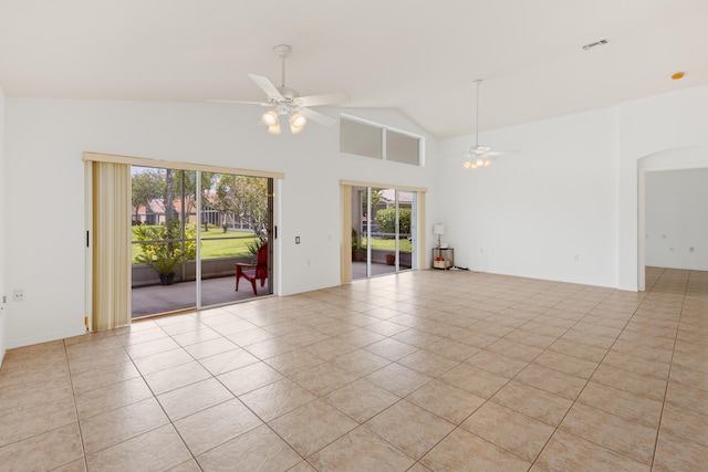 9081 Livorno St, Boynton Beach, FL 33472 - empty room featuring ceiling fan, light tile patterned floors, healthy amount of natural light, and high vaulted ceiling