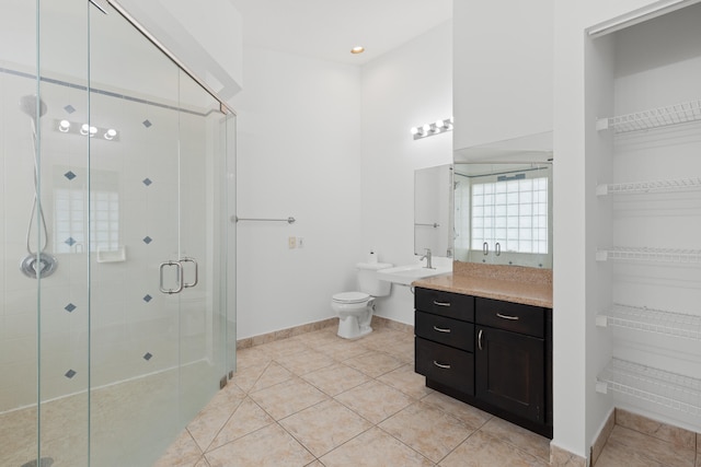 9081 Livorno St, Boynton Beach, FL 33472 - full bathroom with a stall shower, vanity, tile patterned floors, and toilet