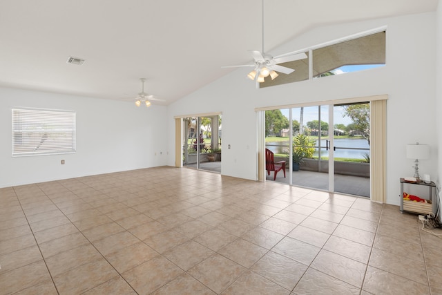 9081 Livorno St, Boynton Beach, FL 33472 - empty room featuring a ceiling fan, plenty of natural light, and high vaulted ceiling