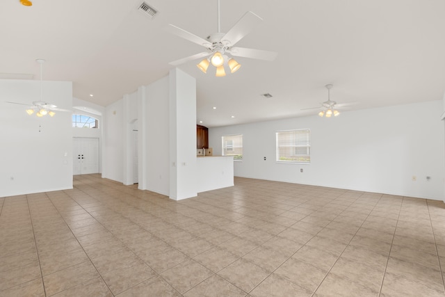 9081 Livorno St, Boynton Beach, FL 33472 - unfurnished living room with a ceiling fan, lofted ceiling, light tile patterned floors, and recessed lighting