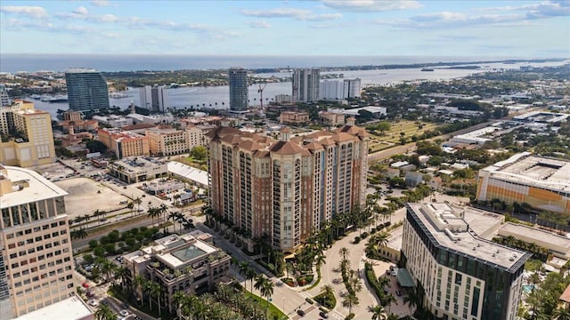 bird's eye view featuring a water view and a view of city