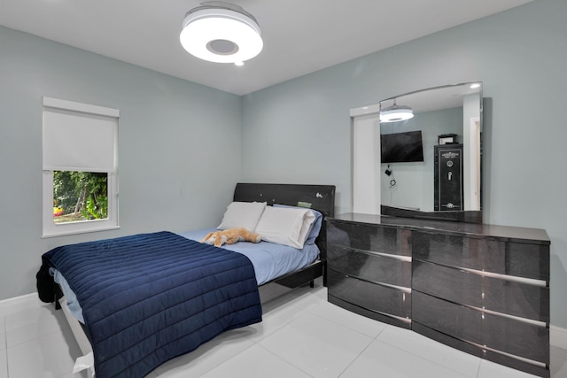 bedroom with light tile patterned flooring