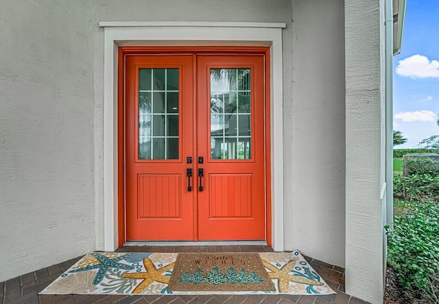 doorway to property with french doors