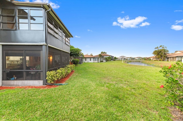 view of yard with a water view