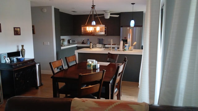 dining room with wood finished floors