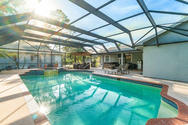 view of pool with a lanai, a patio area, a pool with connected hot tub, and an outdoor hangout area