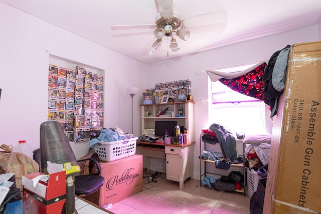 office space with ceiling fan and light tile patterned floors