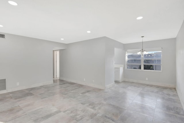 unfurnished room featuring visible vents, a chandelier, baseboards, and recessed lighting