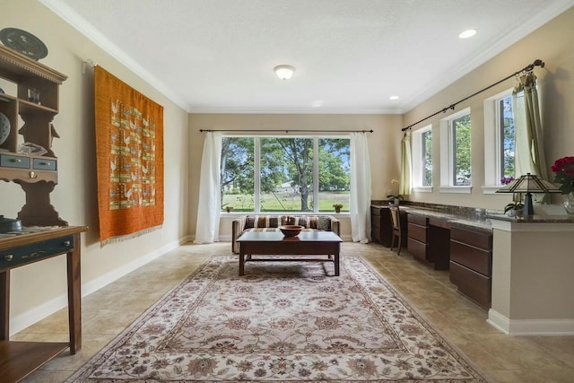 living area featuring crown molding, light tile patterned floors, baseboards, and built in study area