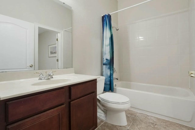 full bath featuring vanity, toilet, and shower / tub combo