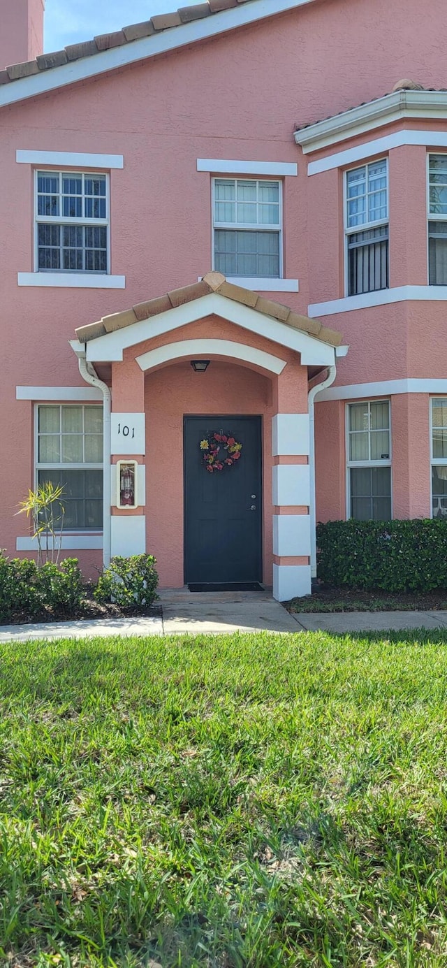 view of property featuring stucco siding