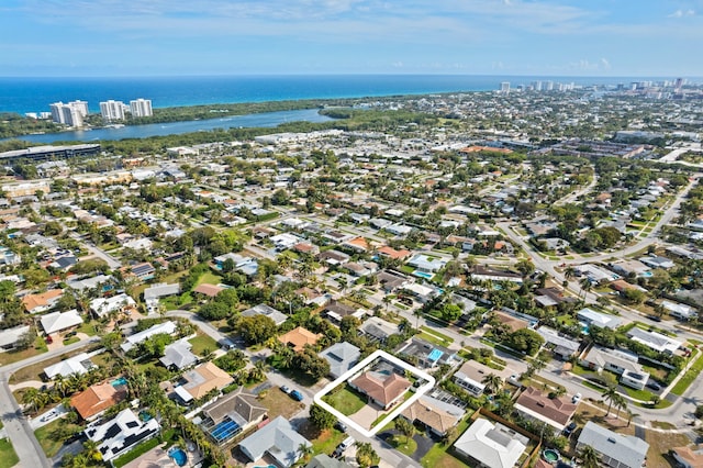 bird's eye view featuring a residential view and a water view