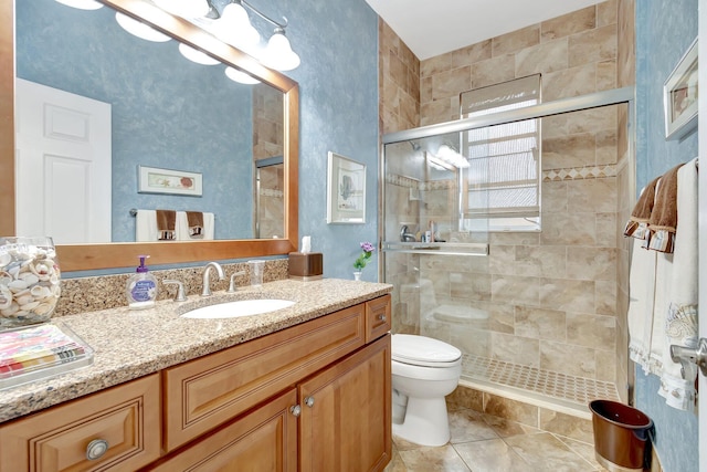 full bathroom with a stall shower, tile patterned flooring, vanity, and toilet