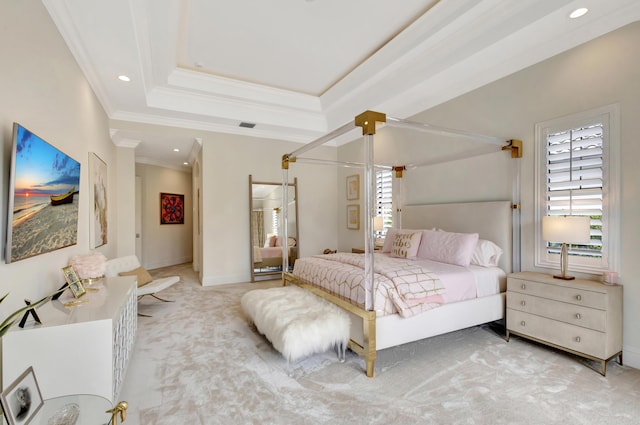 bedroom featuring recessed lighting, carpet floors, baseboards, a tray ceiling, and crown molding