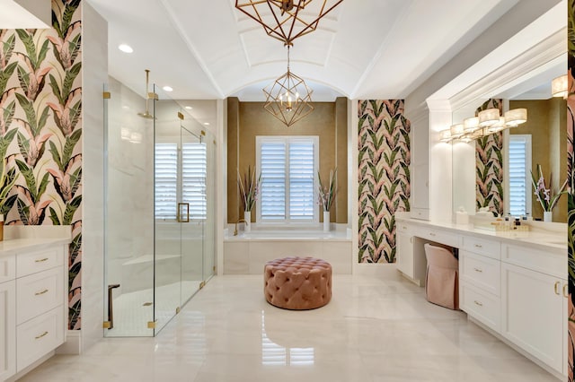 bathroom with a stall shower, a notable chandelier, vanity, and wallpapered walls