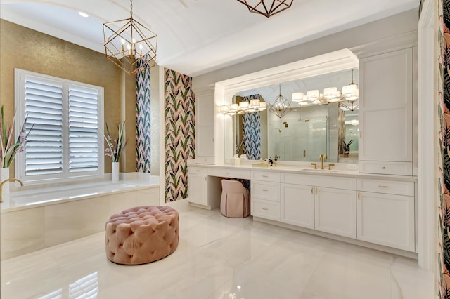 bathroom with a garden tub, a shower stall, and vanity