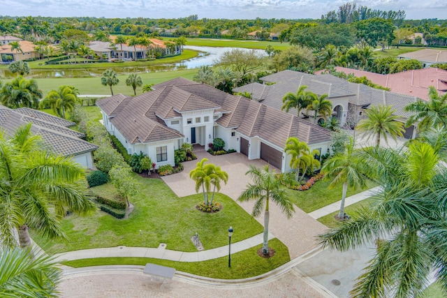 drone / aerial view with a water view